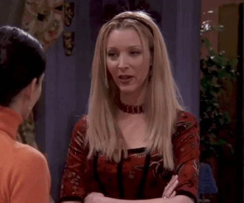 Two women discussing something in a room during a Salesforce Event Management, reminiscent of a scene from Friends Series.