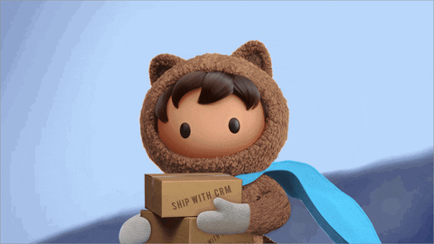 Astro holding a box with a blue cape, representing Salesforce CRM used by companies like Amazon.